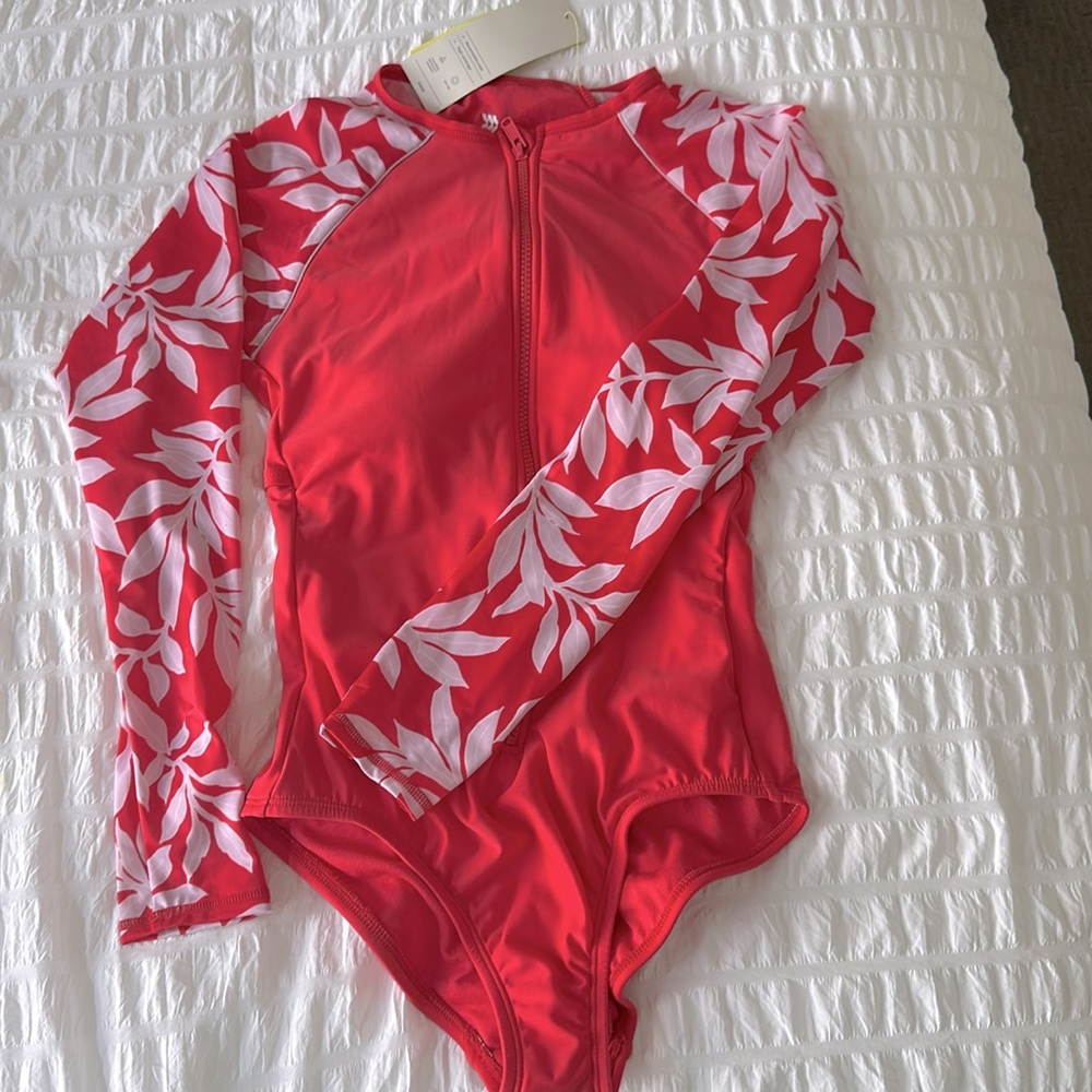 Women’s one piece swim suit/rash guard.